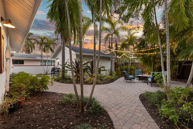 view of patio / terrace featuring an outdoor hangout area and fence private yard