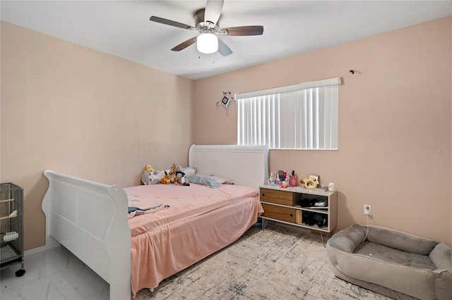 bedroom featuring ceiling fan and light tile patterned flooring