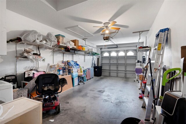 garage with ceiling fan and a garage door opener