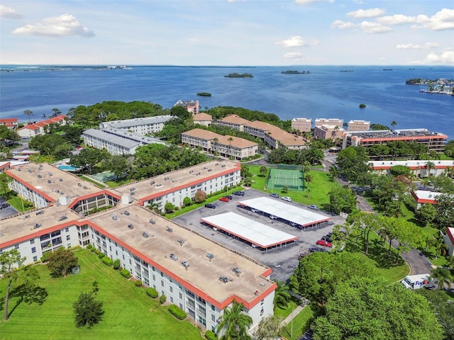 drone / aerial view with a water view