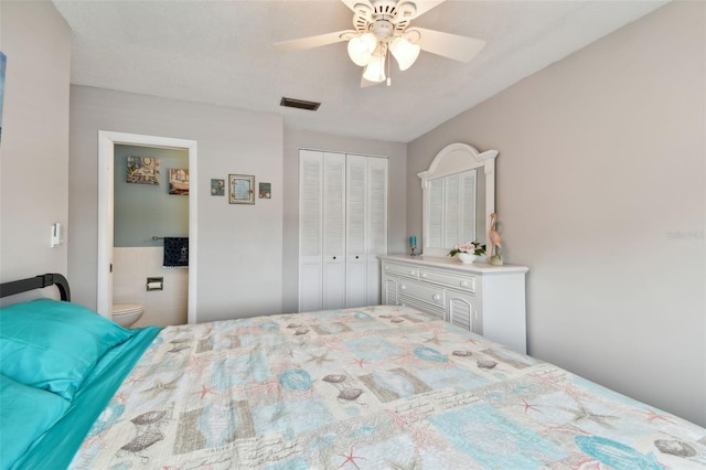 bedroom with connected bathroom, ceiling fan, and a closet