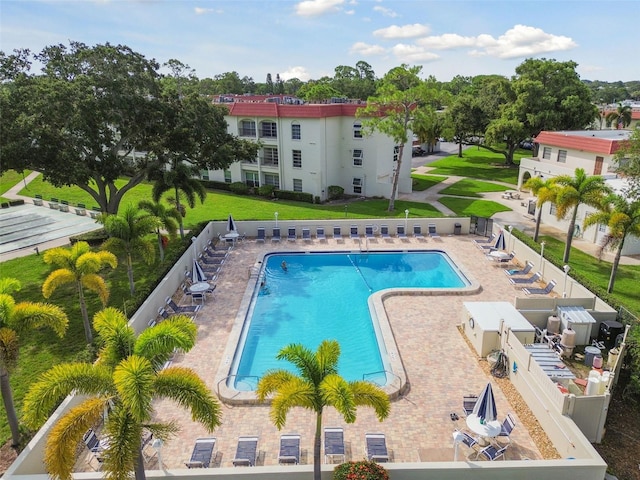 view of swimming pool featuring a patio area