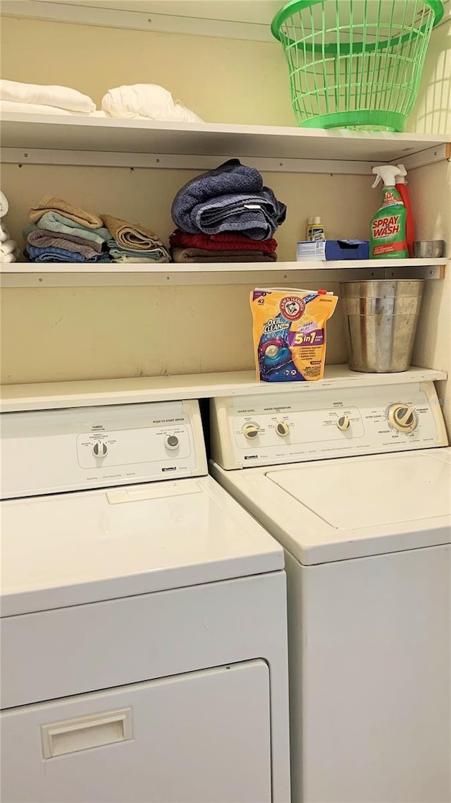 washroom with independent washer and dryer