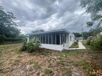 exterior space with a sunroom