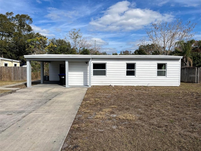 exterior space with a carport