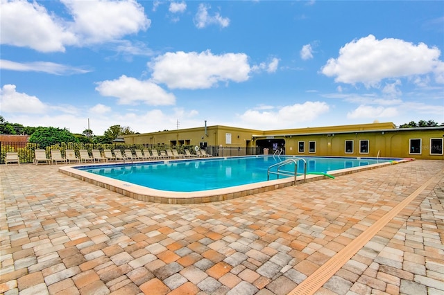 view of pool with a patio area