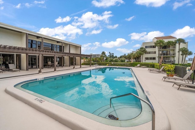 community pool featuring a patio