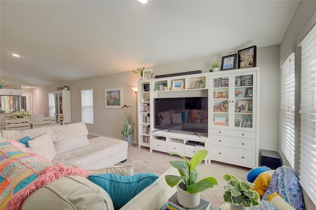 living room featuring light carpet