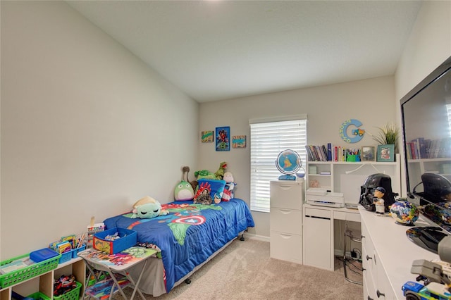 bedroom with light carpet