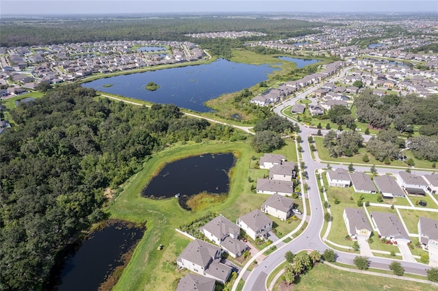 bird's eye view with a residential view and a water view