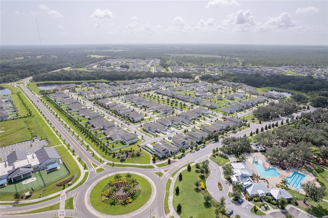 bird's eye view with a residential view and a water view