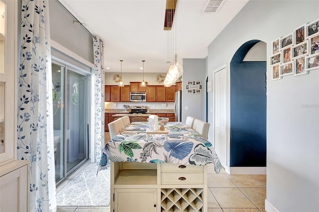 view of tiled dining space