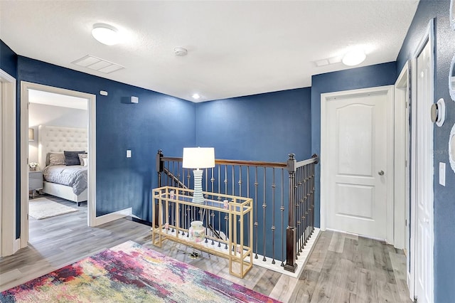 hallway featuring light wood-type flooring