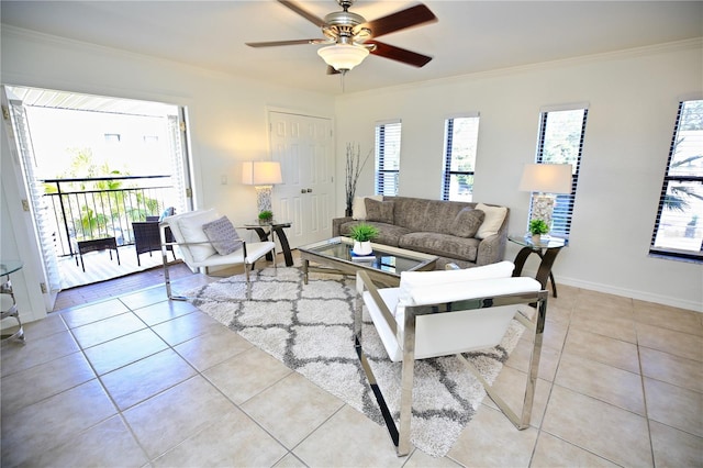 tiled living room featuring ceiling fan and ornamental molding