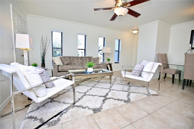 tiled living room featuring crown molding and ceiling fan