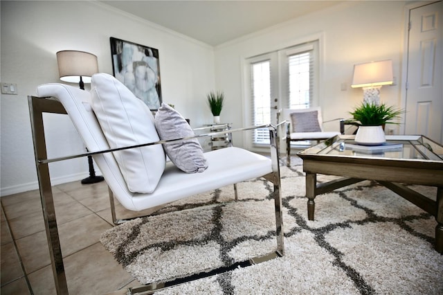 tiled living room with crown molding and french doors