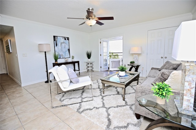 tiled living room featuring ceiling fan and ornamental molding