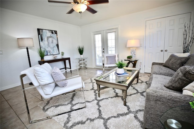 tiled living room featuring french doors, ceiling fan, and ornamental molding