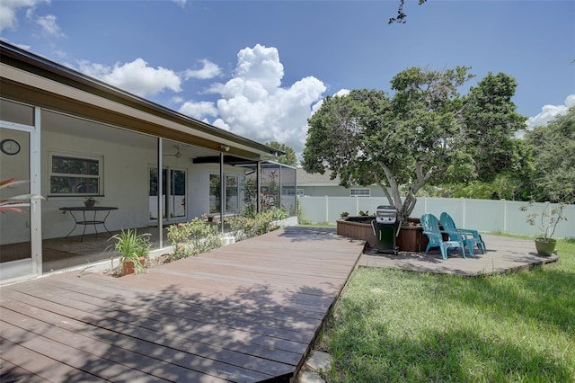 wooden deck with a yard