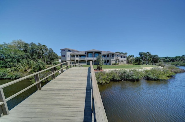 dock area featuring a water view