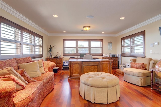 living room with hardwood / wood-style floors and ornamental molding