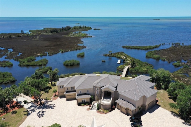 drone / aerial view with a water view