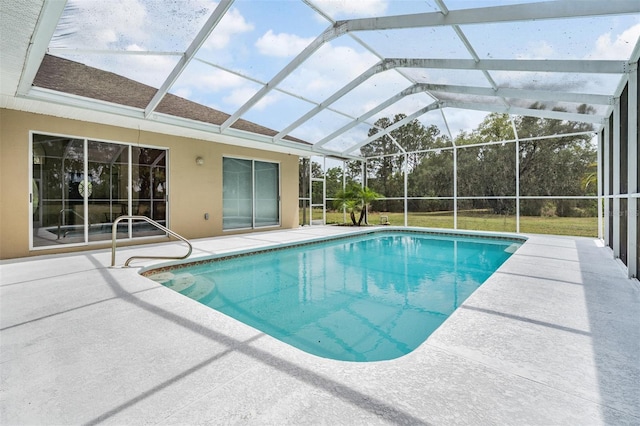 outdoor pool featuring a lanai and a patio