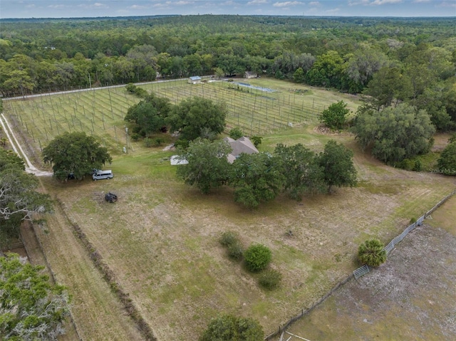 drone / aerial view with a rural view and a view of trees