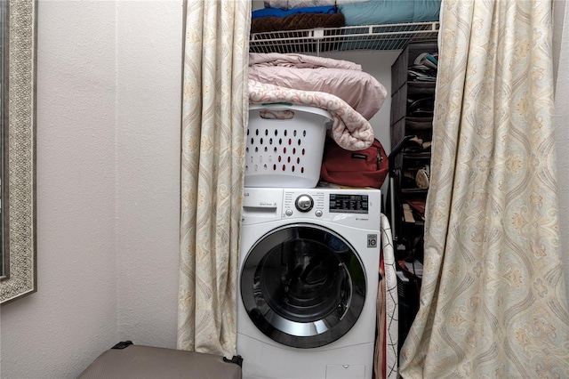 laundry area featuring washer / clothes dryer