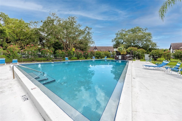 view of pool featuring a patio