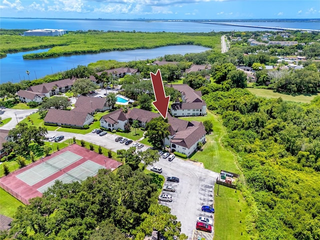 bird's eye view with a water view