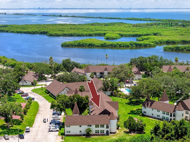 birds eye view of property featuring a water view