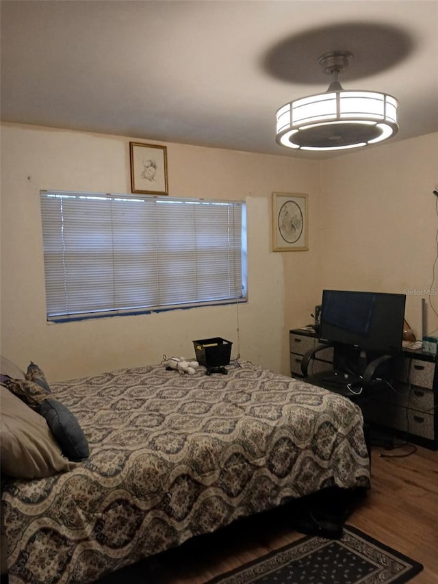 bedroom featuring hardwood / wood-style floors