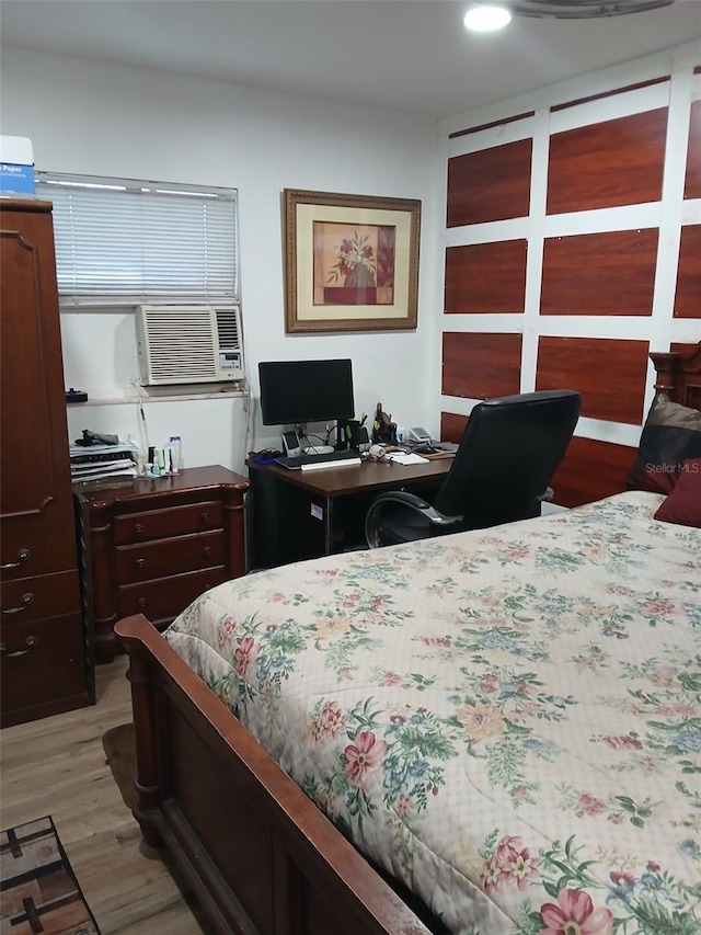 bedroom with light hardwood / wood-style floors