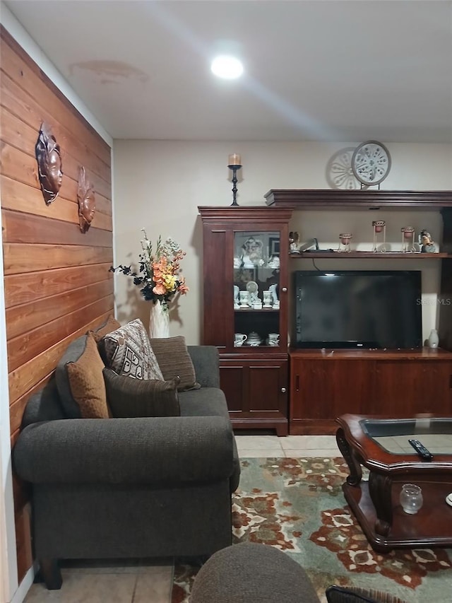 tiled living room with wooden walls