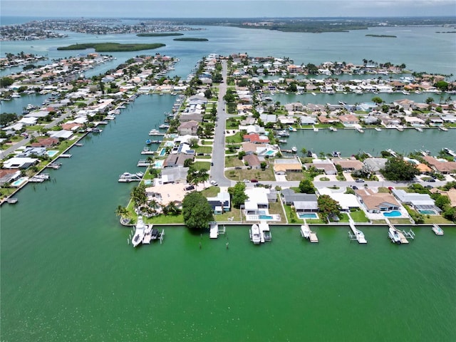 aerial view with a residential view and a water view