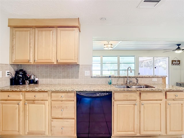 kitchen featuring dishwasher, sink, light brown cabinets, and backsplash