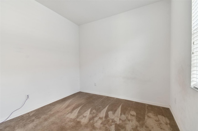 empty room with carpet floors