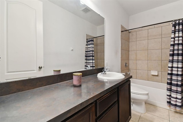 full bathroom with shower / tub combo with curtain, tile patterned floors, toilet, and vanity