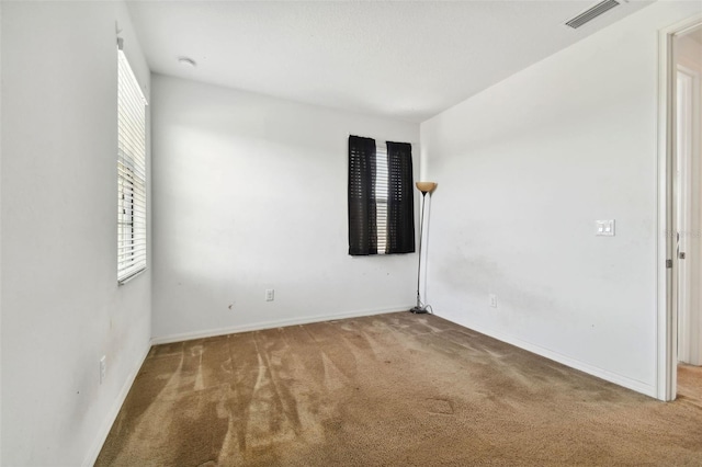 view of carpeted spare room