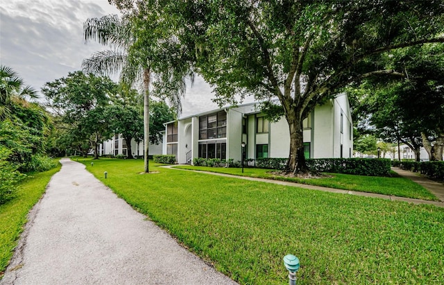 exterior space with a front yard