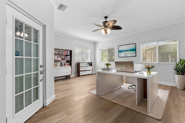 office area featuring ceiling fan, light wood-type flooring, and ornamental molding