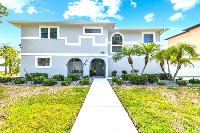 view of front facade with a front yard