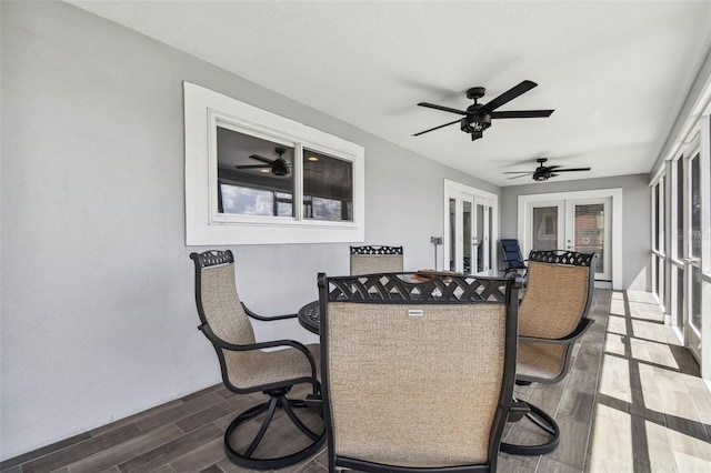 interior space featuring french doors and ceiling fan