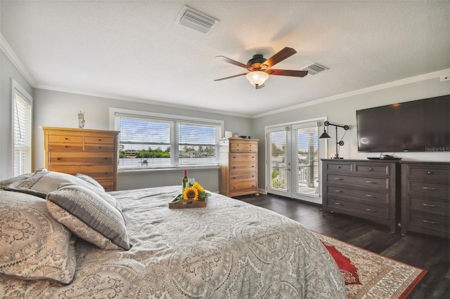 bedroom featuring crown molding, access to exterior, and dark wood-type flooring