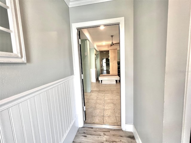 corridor with light hardwood / wood-style flooring