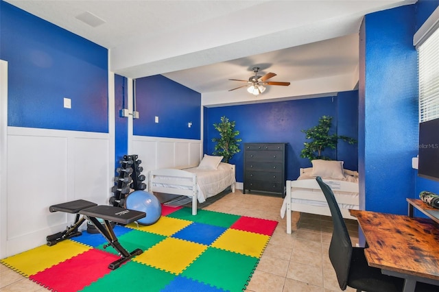 interior space featuring ceiling fan