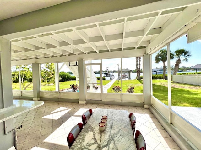 unfurnished sunroom with a healthy amount of sunlight