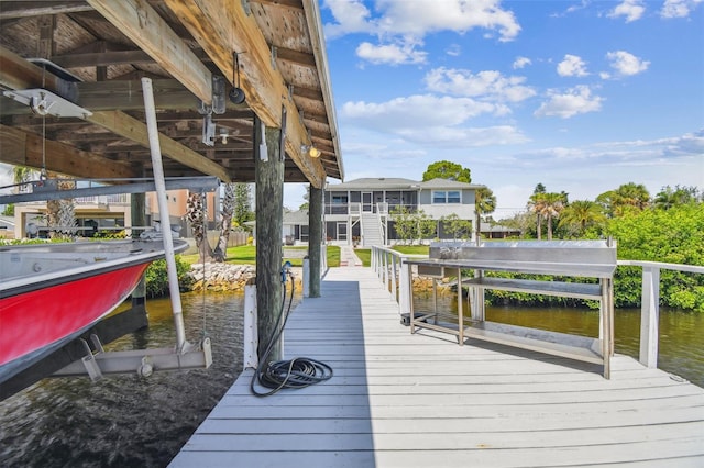 dock area featuring a water view