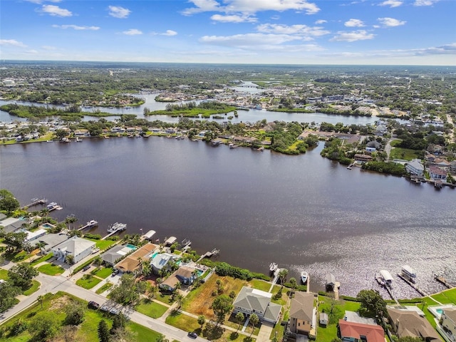 drone / aerial view with a water view